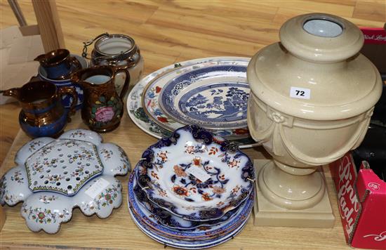 A Portuguese faience flower holder, ironstone plates, lustre jugs, etc.